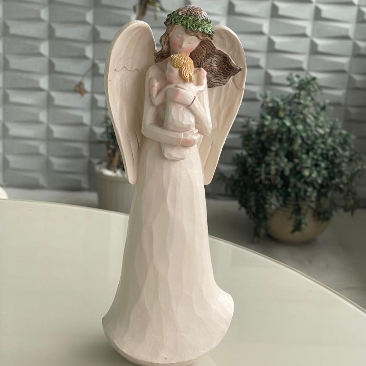 15327726471-977-anjo-com-bebe.jpg